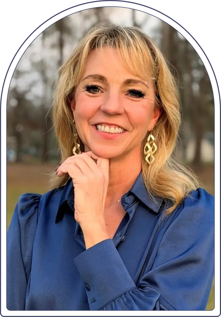 Robyn Mae Harrison smiling in a framed portrait
