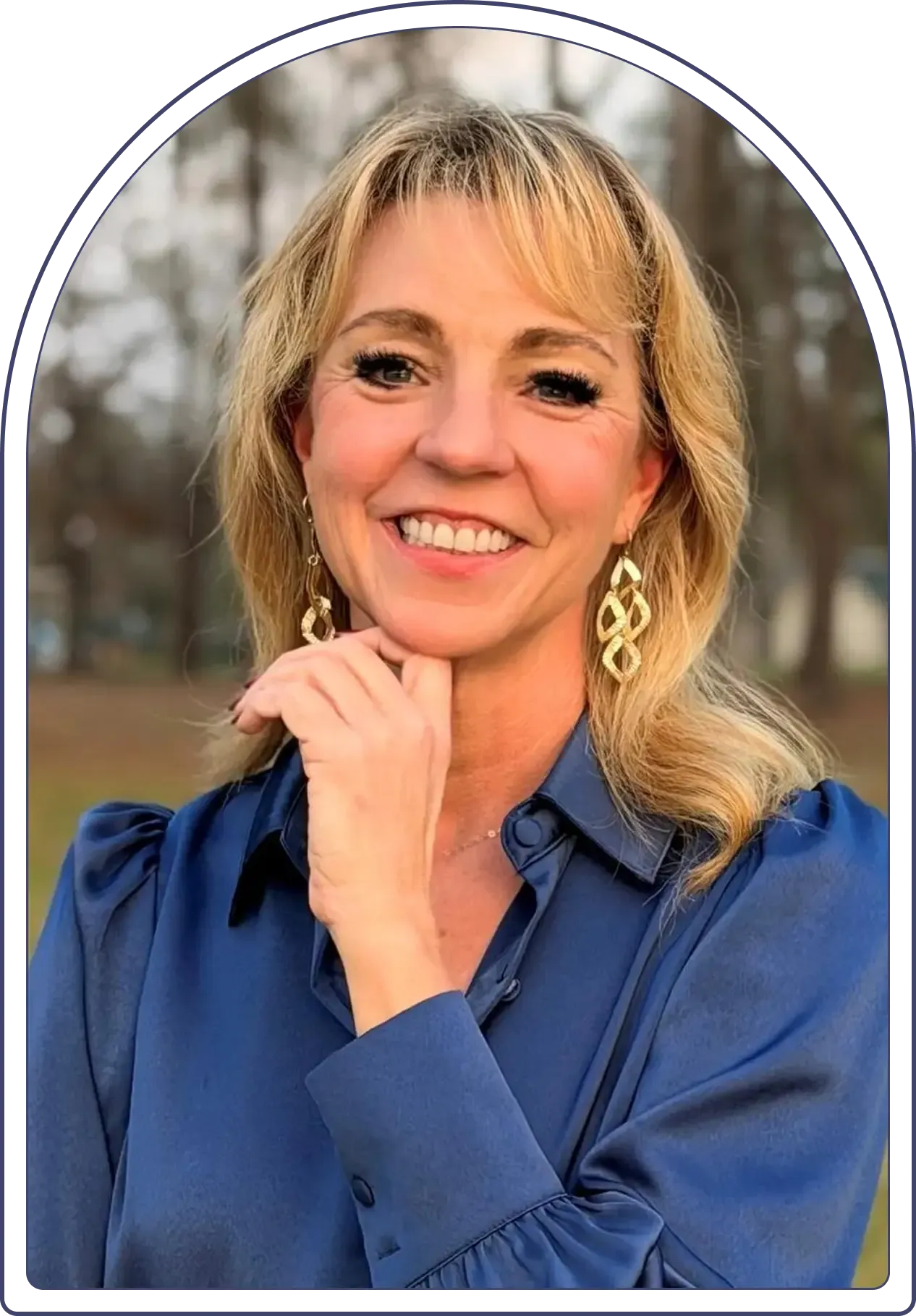 Robyn Mae Harrison smiling in a framed portrait